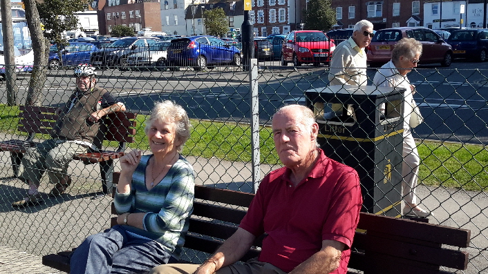 Ashley and Judy enjoy the sun. Who is that at the back in the hat?