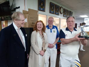 The Captain gets the trophy